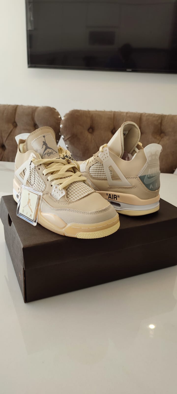 Off-White x Air Jordan 4 Retro WMNS "Sail"